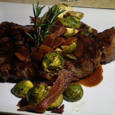16 oz. Prime Ribeye Steak with Roasted Brussels Sprouts, Red Salt; photo by Richard Bilow; courtesy of ETG
